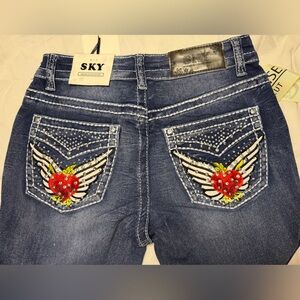 Women's SKY Collection Blue Low Rise Jeans back pocket bedazzled design